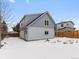 Newly built studio sits above garage in snowy backyard at 2615 N Steele St, Denver, CO 80205