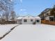 Front view of the house showcasing its landscaping at 2615 N Steele St, Denver, CO 80205