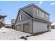 Detached two-car garage with extra living space above at 2615 N Steele St, Denver, CO 80205