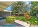 Back patio featuring vibrant outdoor seating and lush landscaping at 1338 S Fairfax St, Denver, CO 80222