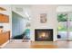 Cozy fireplace with tiled hearth and modern design, adding warmth and style to the living space at 1338 S Fairfax St, Denver, CO 80222
