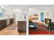 Open-concept living space with modern kitchen and living room, perfect for entertaining and Gathering gatherings at 1338 S Fairfax St, Denver, CO 80222