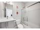 Stylish bathroom with a sleek vanity, modern fixtures, and a shower with glass door at 2922 W 26Th Ave # 1, Denver, CO 80211