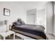 Cozy bedroom featuring elegant decor, neutral tones, and ample closet space at 2922 W 26Th Ave # 1, Denver, CO 80211