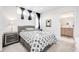 Modern bedroom features contemporary furnishings, decor, and an ensuite bathroom at 2922 W 26Th Ave # 1, Denver, CO 80211