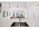 Modern kitchen island sink with view into the living space at 2922 W 26Th Ave # 1, Denver, CO 80211