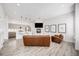 Open-concept living room showcasing the kitchen, fireplace, and inviting seating area at 2922 W 26Th Ave # 1, Denver, CO 80211