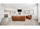 Bright, open living area with kitchen, modern fireplace, and stylish furnishings at 2922 W 26Th Ave # 1, Denver, CO 80211