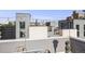 Scenic rooftop patio with panoramic city views and cozy outdoor seating at 2922 W 26Th Ave # 1, Denver, CO 80211