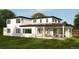 Modern home with covered patio and stone details at 3820 Pierson Ct, Wheat Ridge, CO 80033