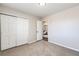 Spare bedroom with closet and carpeted floor at 1255 S Welch Cir, Lakewood, CO 80228