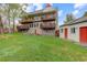 Multi-level decks enhance this charming home overlooking a spacious yard with an outbuilding at 1203 6Th St # 1203, Golden, CO 80403