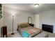 Bright main bedroom features a closet, a dresser, and cozy decor at 1203 6Th St # 1203, Golden, CO 80403