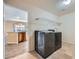 Well-equipped laundry room featuring a modern washer and dryer set and convenient shelving at 22991 Hope Dale Ave, Parker, CO 80138