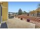 Spacious outdoor patio with tiered landscaping, fountain, and dining area at 22991 Hope Dale Ave, Parker, CO 80138