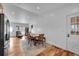 Bright dining area features a table for six and access to outdoor spaces at 5183 Durham Ct, Denver, CO 80239