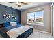 Spacious bedroom with large window offering great views at 8939 Devinney Ct, Arvada, CO 80005