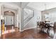 Bright dining room with hardwood floors and open concept design at 8939 Devinney Ct, Arvada, CO 80005