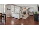 Bright living room with hardwood floors and a stone fireplace at 8939 Devinney Ct, Arvada, CO 80005