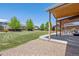 Relaxing patio area with pergola and seating at 8939 Devinney Ct, Arvada, CO 80005