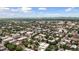 Wide aerial shot featuring a mix of residential areas, commercial buildings, and distant mountain views at 1352 N Downing St, Denver, CO 80218