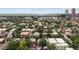 Panoramic cityscape view with diverse architecture, tree-lined streets, and mountains in the distance at 1352 N Downing St, Denver, CO 80218