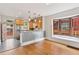 Kitchen boasts stainless steel appliances, granite countertops, and a sunny window with a view at 1352 N Downing St, Denver, CO 80218