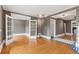 Bright living room with hardwood floors and glass doors, complemented by neutral wall colors at 1352 N Downing St, Denver, CO 80218