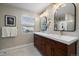 Elegant bathroom with double vanity and updated fixtures at 5450 Flower Ct, Arvada, CO 80002