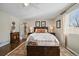 Spacious bedroom with hardwood floors and built-in storage at 5450 Flower Ct, Arvada, CO 80002