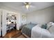 Cozy bedroom with a desk and built-in shelving at 5450 Flower Ct, Arvada, CO 80002