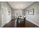 Elegant dining room with hardwood floors and a chandelier at 5450 Flower Ct, Arvada, CO 80002