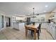 Spacious kitchen with white cabinets, granite countertops, and an island at 5450 Flower Ct, Arvada, CO 80002