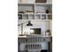 Functional home office with built-in shelving and desk at 5450 Flower Ct, Arvada, CO 80002