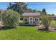 Charming playhouse in the backyard, surrounded by greenery at 5450 Flower Ct, Arvada, CO 80002