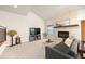 Living room features a cozy fireplace, high ceilings, and natural light at 2609 S Quebec St # 9, Denver, CO 80231