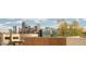 Rooftop view showcasing the vibrant cityscape skyline and nearby buildings at 1945 W 34Th Ave, Denver, CO 80211