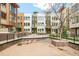Modern townhome exteriors with unique architecture, landscaping, and community space at 1945 W 34Th Ave, Denver, CO 80211