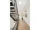 Modern hallway with sleek staircase, hardwood floors, and contemporary decor at 1945 W 34Th Ave, Denver, CO 80211