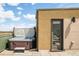 Private rooftop deck features an inviting hot tub and seamless indoor/outdoor living at 1945 W 34Th Ave, Denver, CO 80211