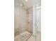 Modern shower with glass door, rain shower head, and sleek design at 1945 W 34Th Ave, Denver, CO 80211