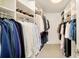 Organized walk-in closet with ample storage for clothes and accessories at 1945 W 34Th Ave, Denver, CO 80211