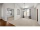 Bright dining room with hardwood and carpeted floors, and a chandelier at 958 Bramblewood Dr, Castle Pines, CO 80108