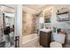 Nicely remodeled bathroom featuring tiled shower-tub combo and modern vanity at 2986 W Union Ave, Englewood, CO 80110