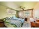 Bedroom featuring a mix of colors, carpeted floors, and natural light at 2986 W Union Ave, Englewood, CO 80110