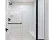 Modern bathroom features a glass-enclosed shower with white subway tiles and a built-in bench at 15773 Timber Trek Way, Monument, CO 80132