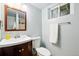 Bathroom featuring a modern vanity, fixtures, and natural light at 12030 W Alameda Pkwy, Lakewood, CO 80228