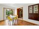 Cozy dining area adjacent to the kitchen, featuring a modern table and chairs, perfect for everyday meals at 12030 W Alameda Pkwy, Lakewood, CO 80228
