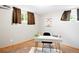 Bright room with natural light, neutral walls, and a modern work space at 12030 W Alameda Pkwy, Lakewood, CO 80228
