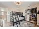 Cozy room with a bunk bed, closet, and hardwood flooring at 26731 E Hinsdale Pl, Aurora, CO 80016